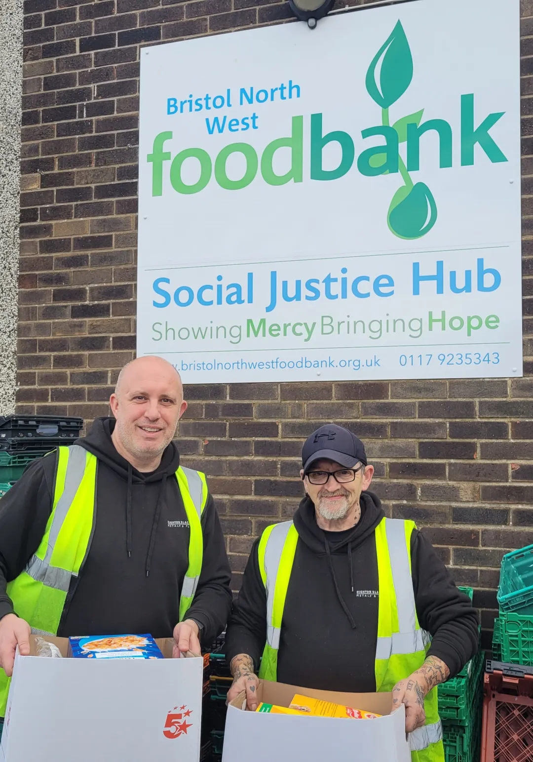 Matt Irwin and Richard Amos delivering supplies to the Bristol North West Foodbank